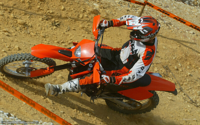 racing on a dirt bike