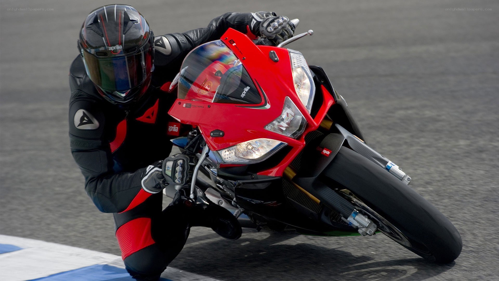 Racing on a red motorcycle
