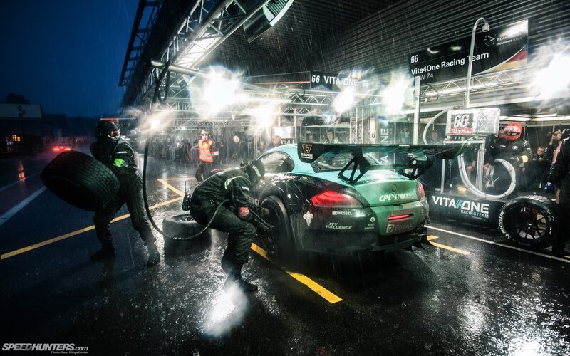 Racing Team Changing Tires