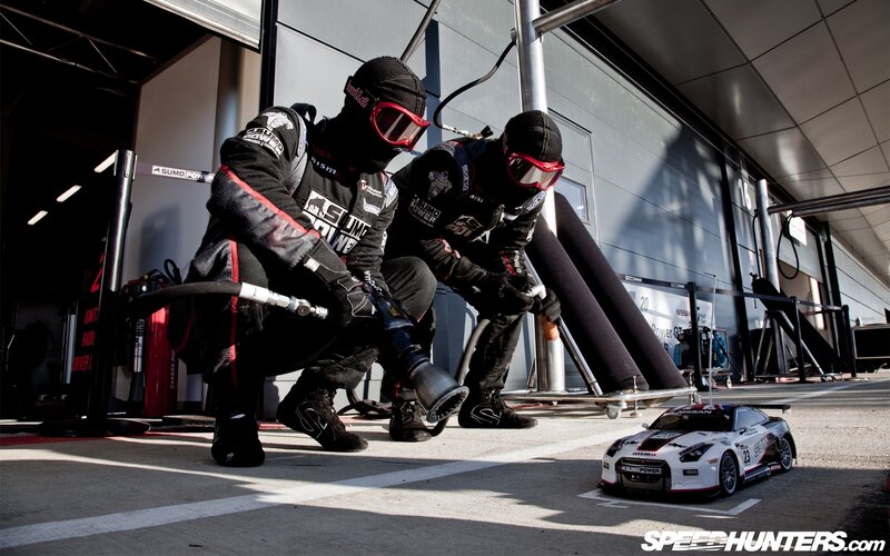 Racing Team in Pit — Black, Dramatic