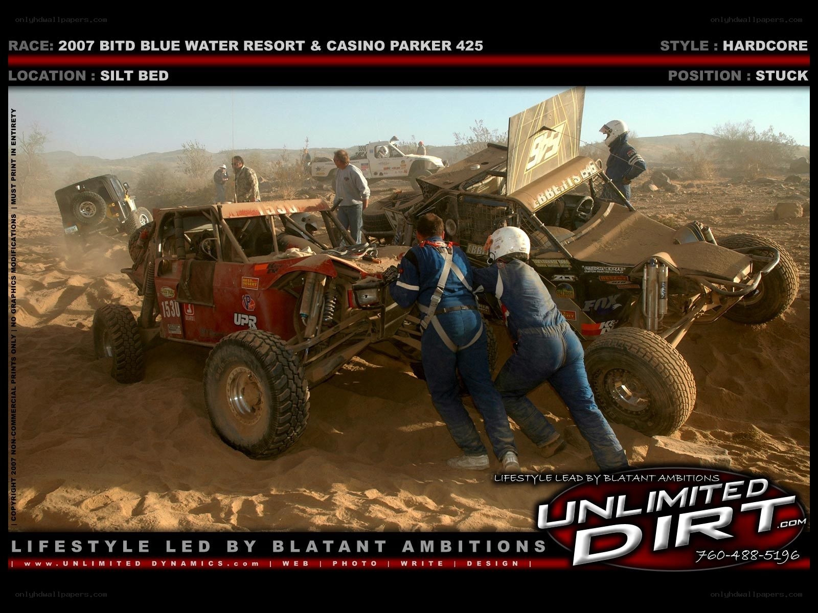 Racing team stuck in sand