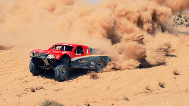 Racing Truck in Desert — Red, Dynamic, Afternoon