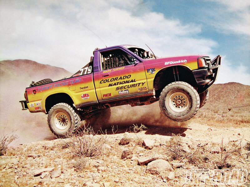 Racing Truck in Desert — Yellow