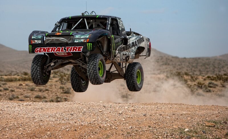 racing truck in mid-air