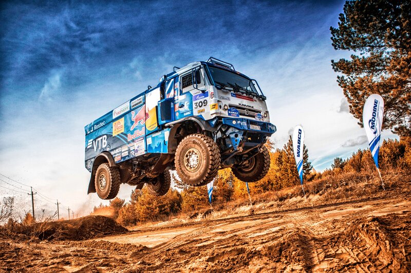 Racing Truck in Mid-air — Blue, Dramatic