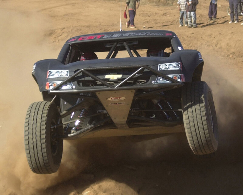 Racing Truck in Mid-air — Brown, Dynamic
