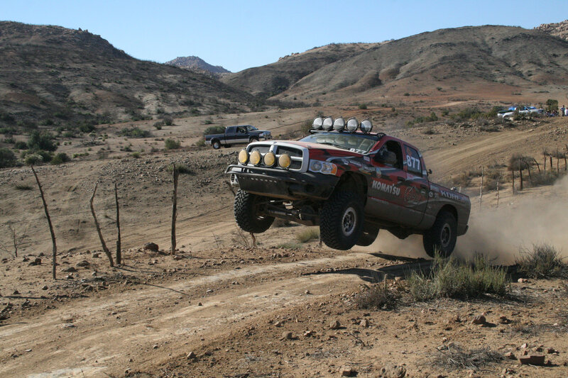 Racing Truck in Mid-air — Brown