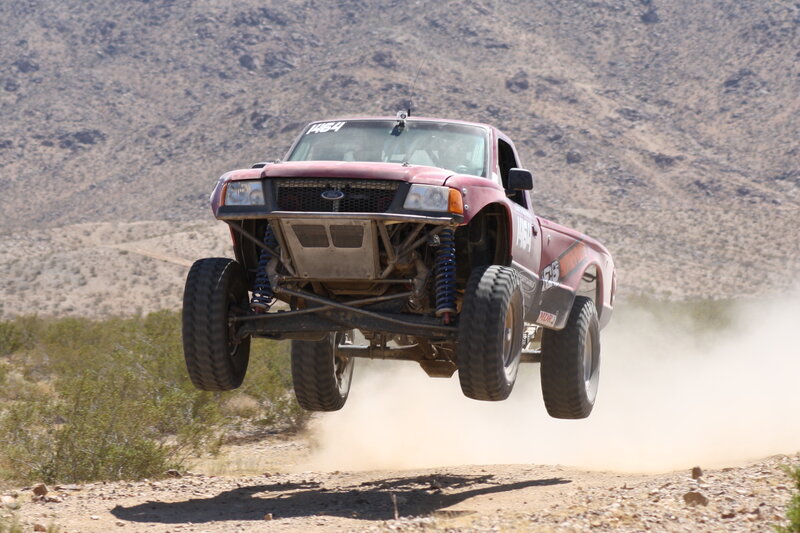 racing truck in mid-air