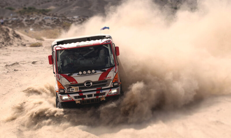 Racing Truck in Sand — Brown, Dynamic