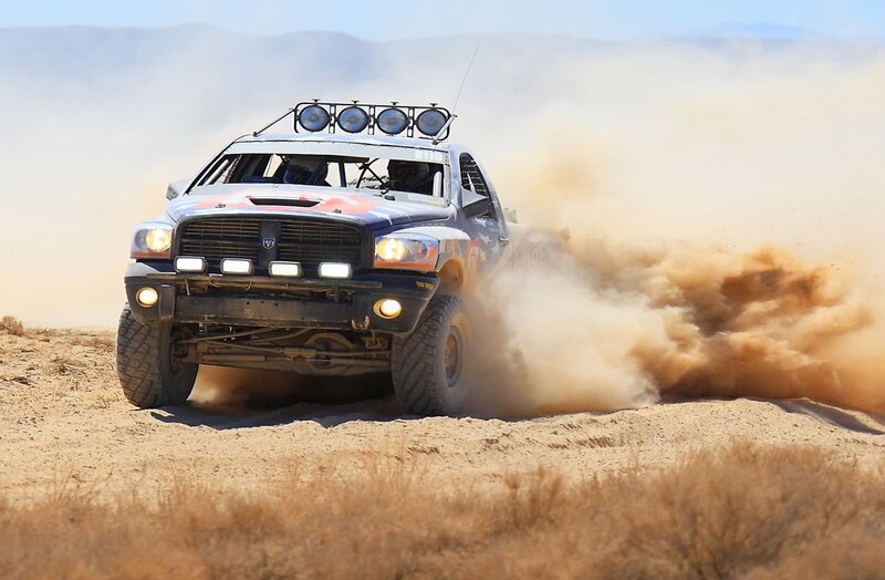 racing truck kicking up dust