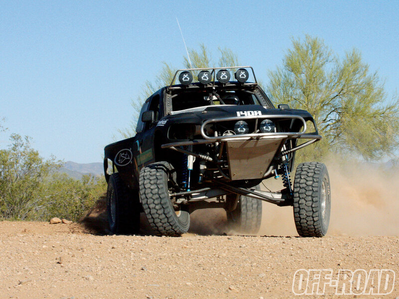 Racing Truck on Dirt — Black