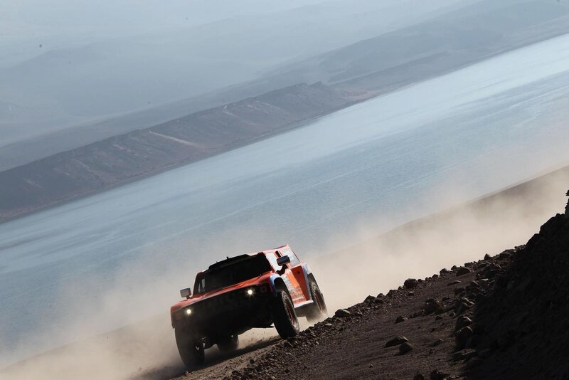 Racing Truck on Dirt — Orange