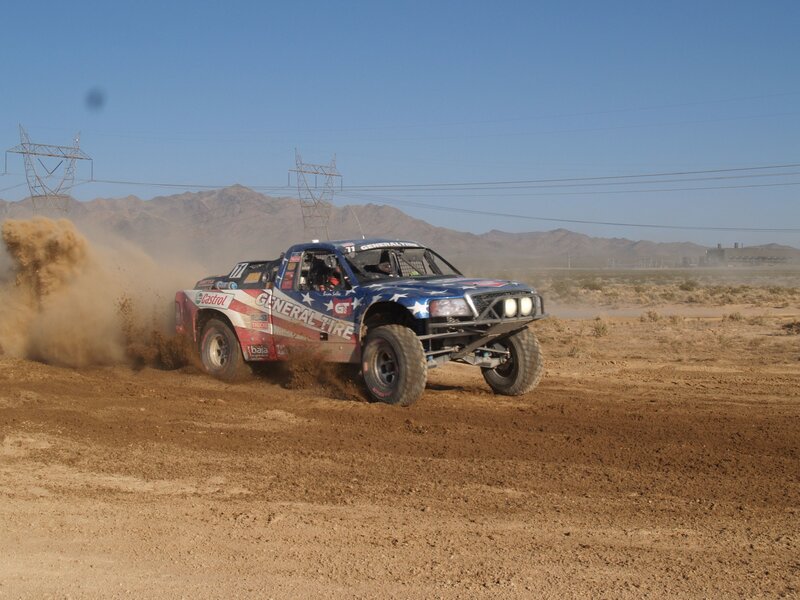 Racing truck on dirt track