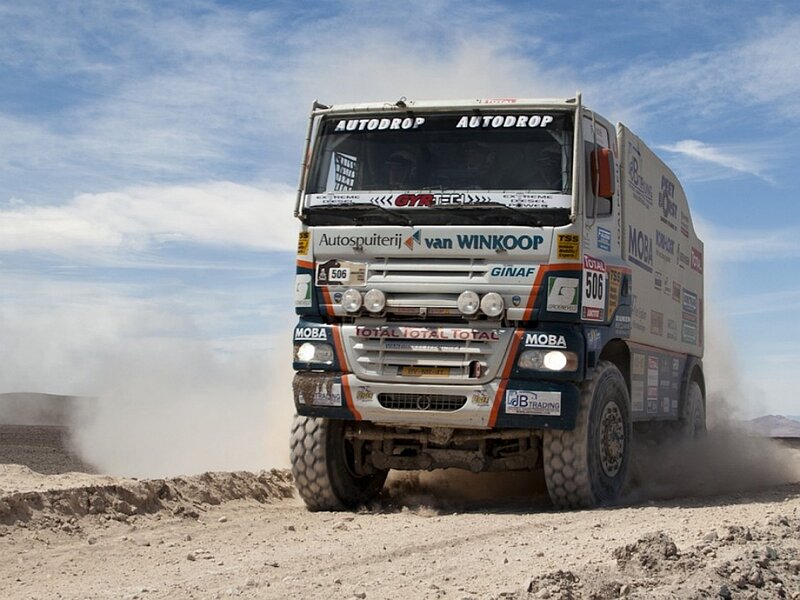 Racing Truck on Dirt — White, Dynamic, Afternoon