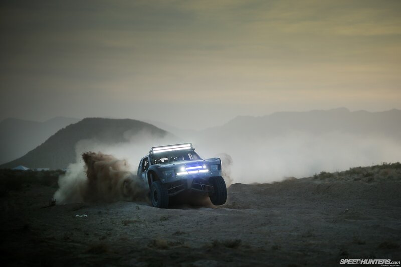 Racing truck on dusty terrain