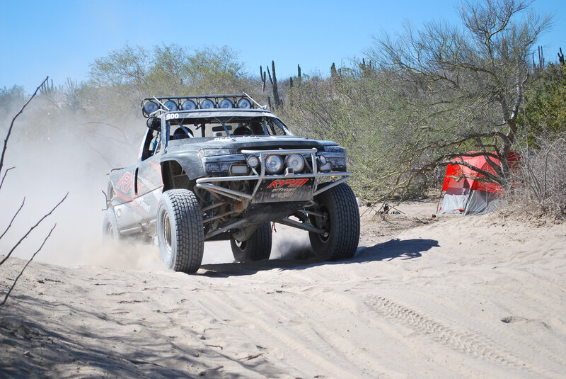 Racing Truck on Sand — Brown
