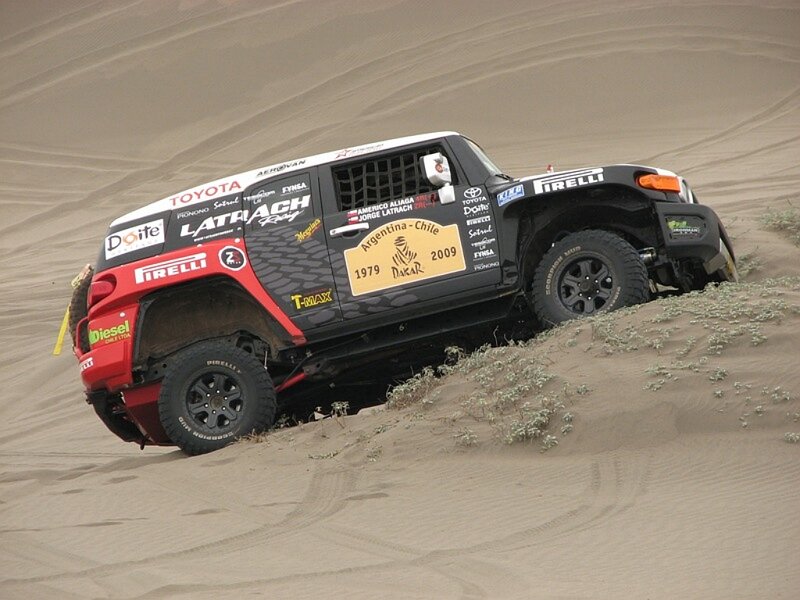 Racing Truck on Sand Dune — Black