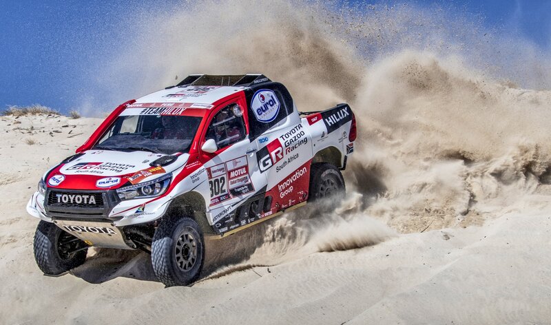Racing Truck on Sand — White