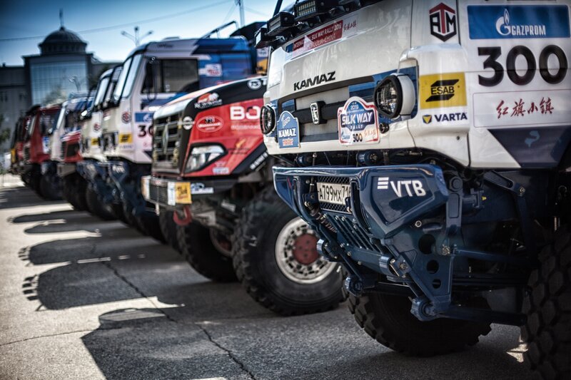 Racing Trucks in a Line