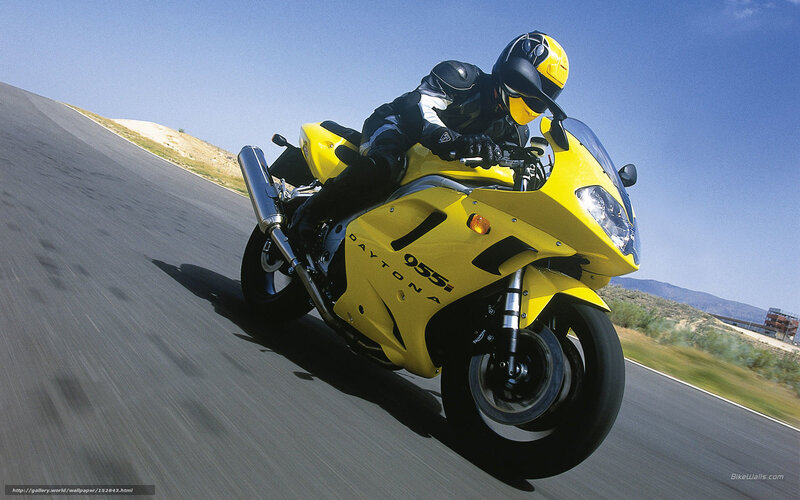 racing yellow motorcycle on track