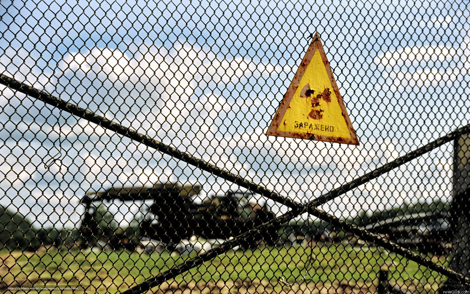 Radiation warning sign behind fence
