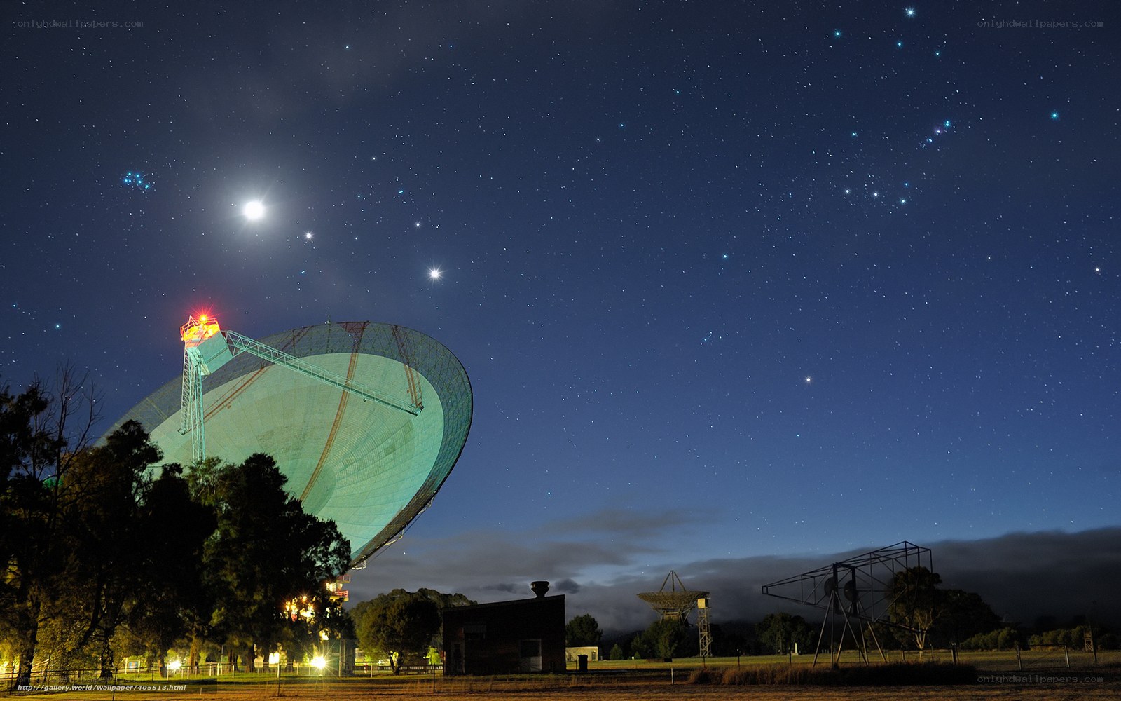 Radio telescope under starry sky
