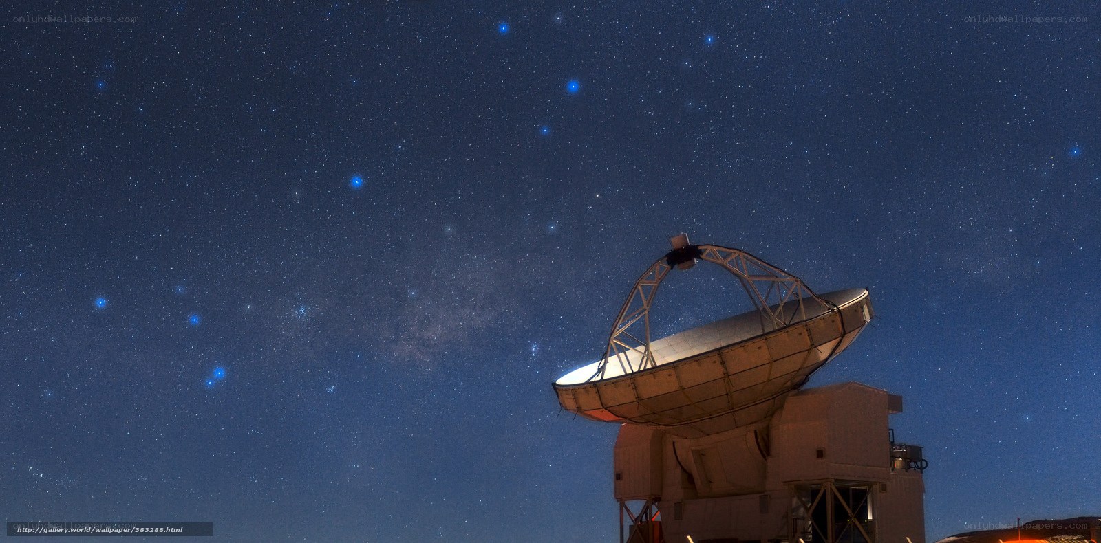 Radio telescope under starry sky