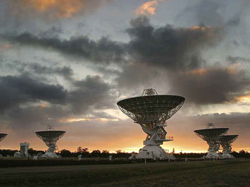 Radio Telescopes at Sunset — Orange