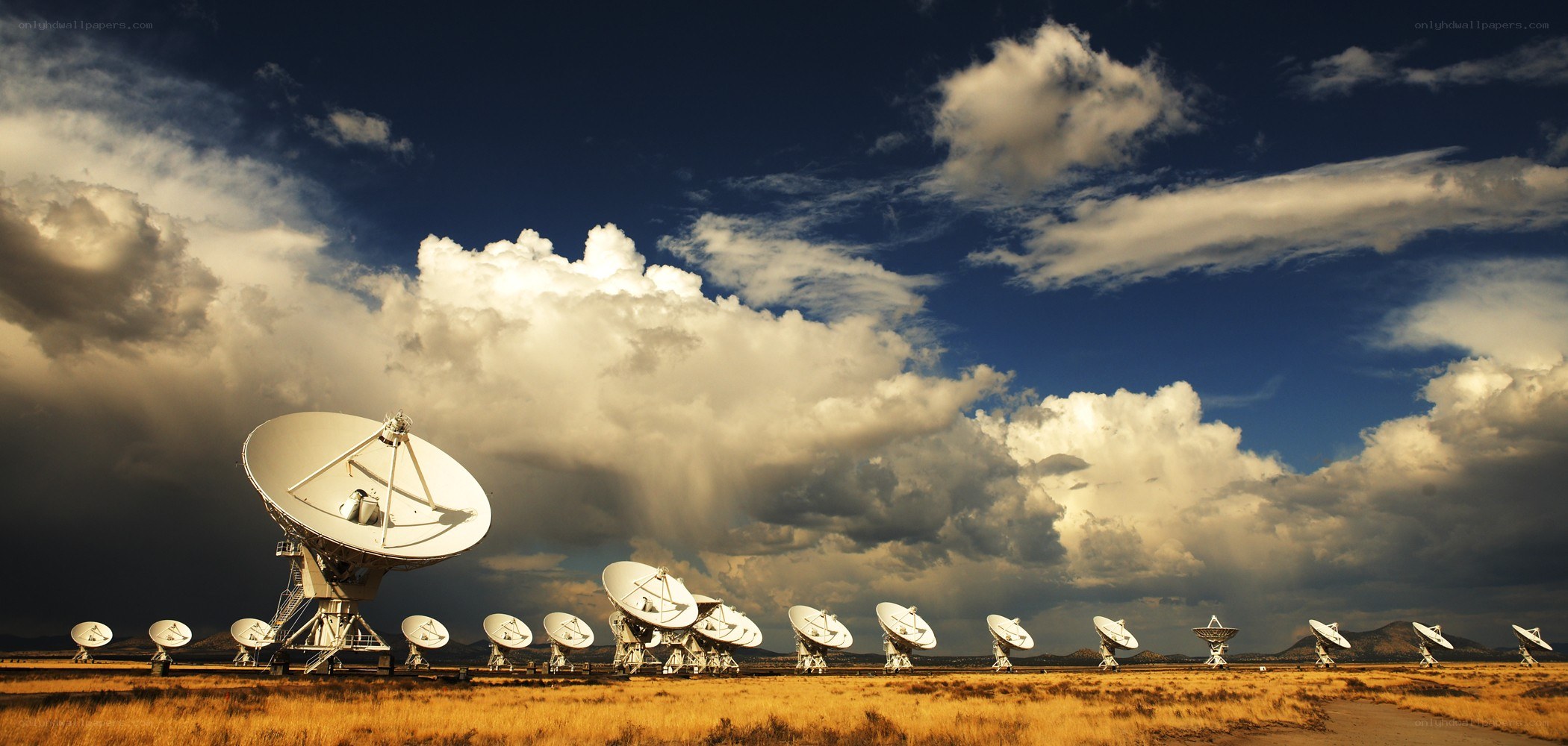 Radio telescopes under cloudy sky