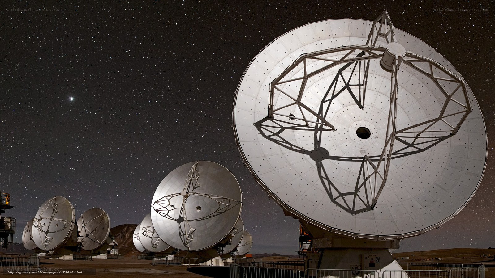 Radio telescopes under starry sky