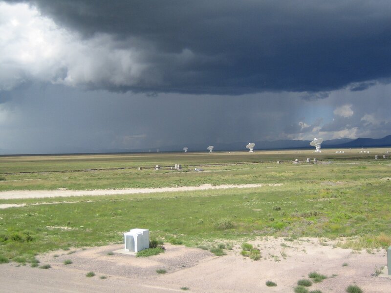 Radio telescopes under stormy sky