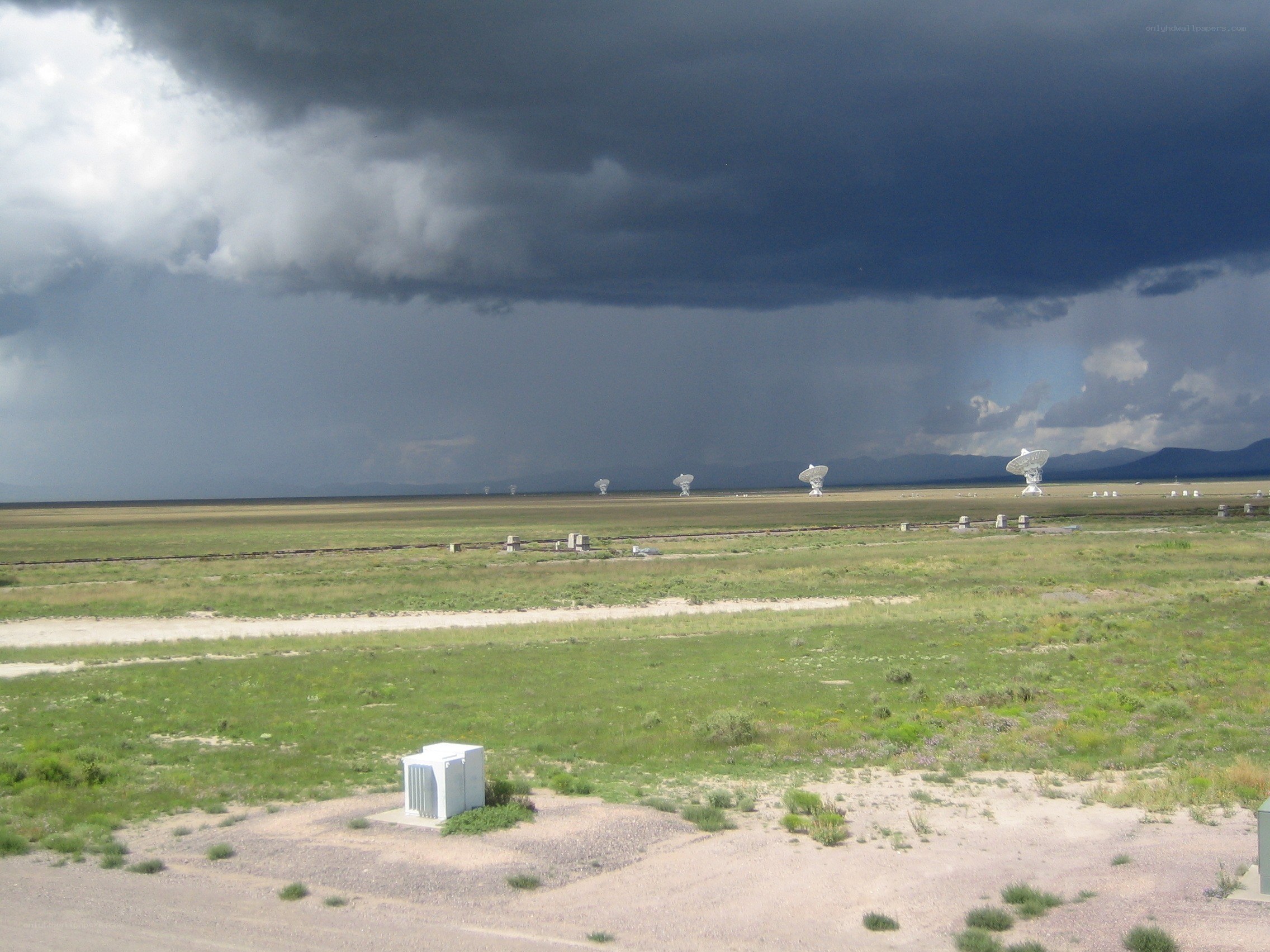 Radio telescopes under stormy sky