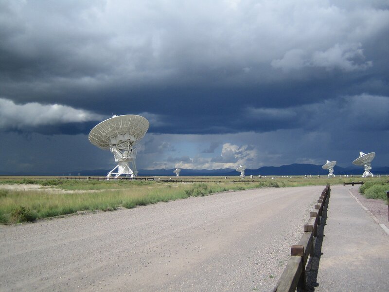 Radio telescopes under stormy sky