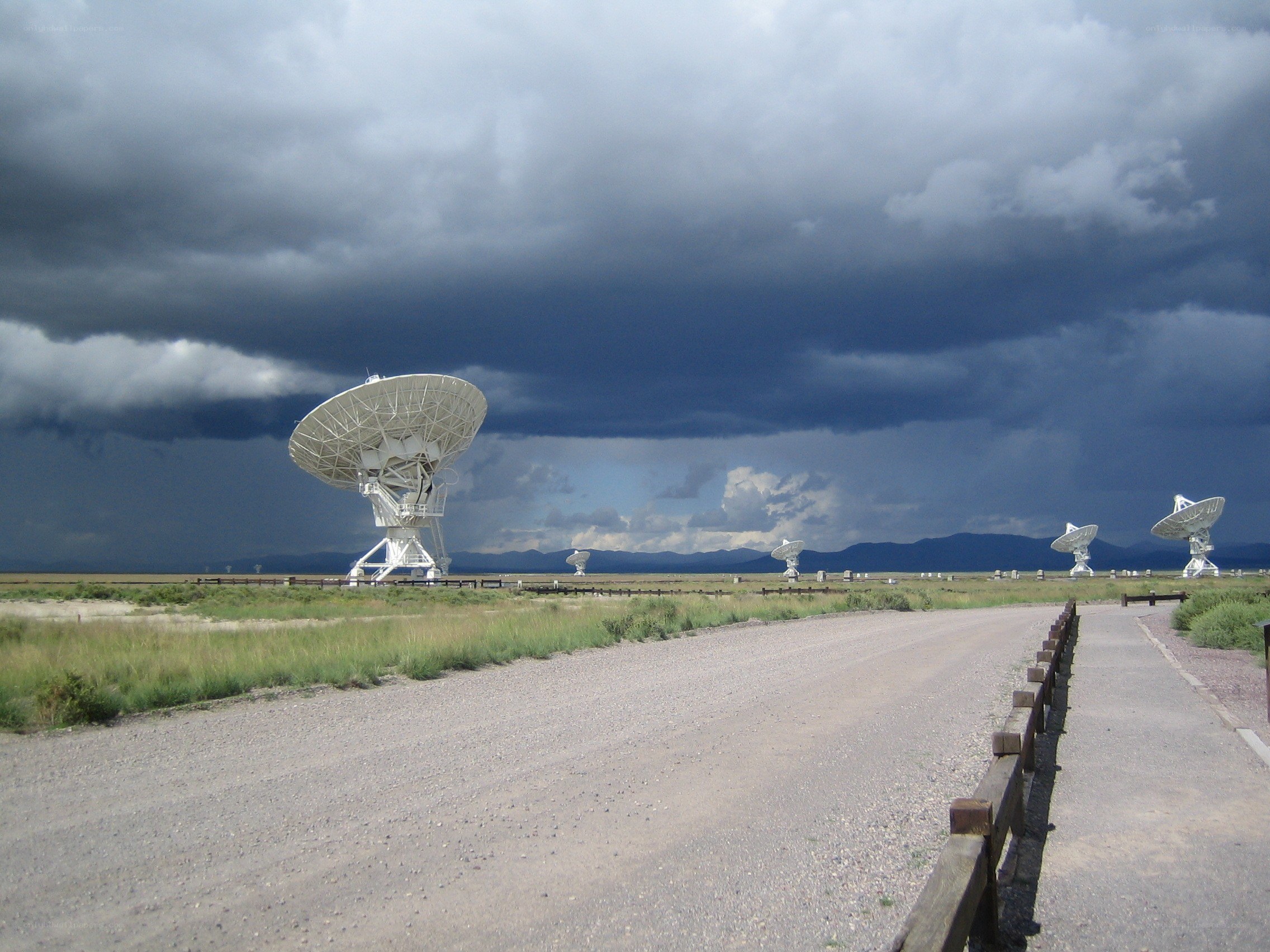 Radio telescopes under stormy sky