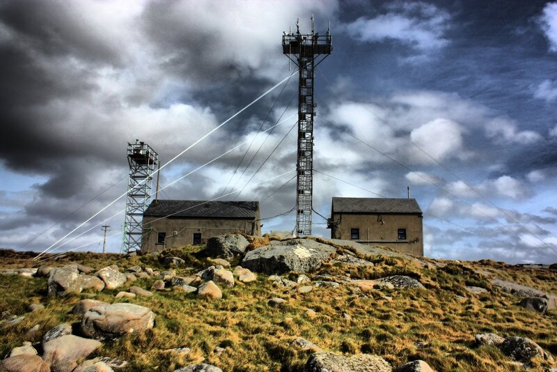 Radio towers on a rocky hill