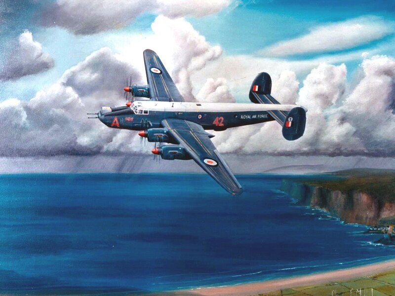RAF bomber over coastline
