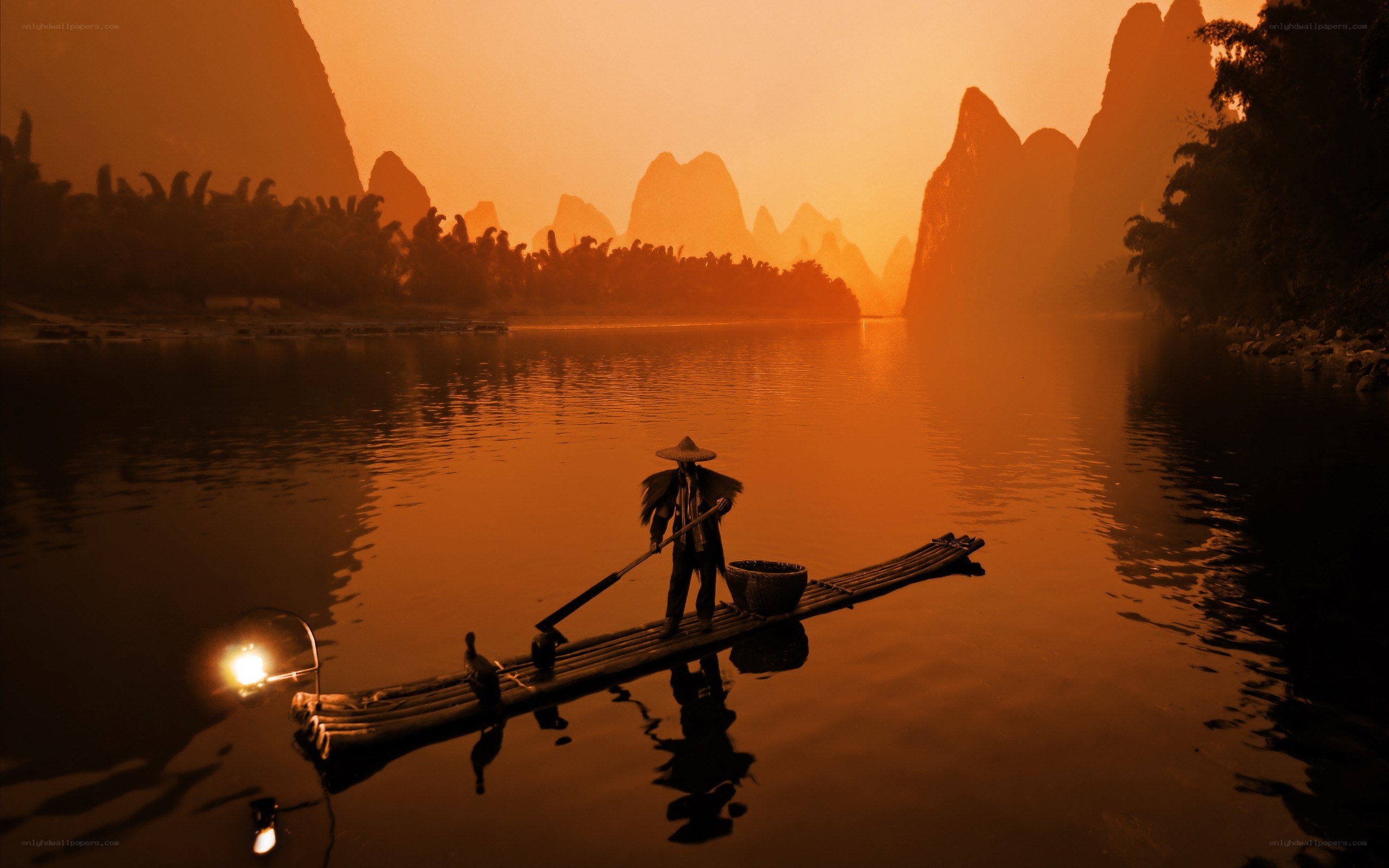 Rafting at sunset in karst landscape