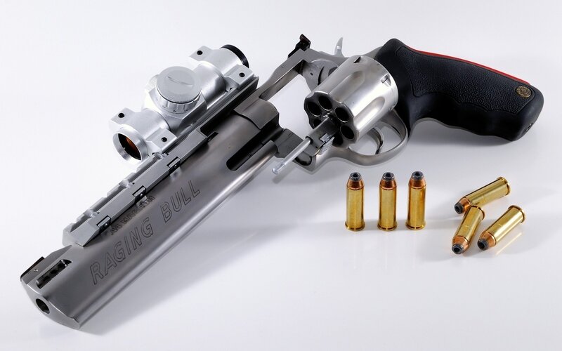 Raging Bull revolver with ammunition