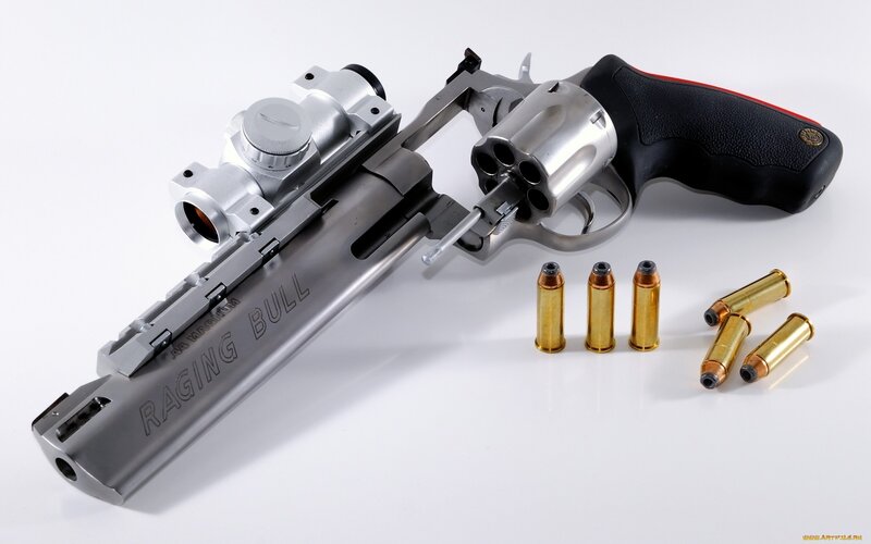 Raging Bull revolver with ammunition