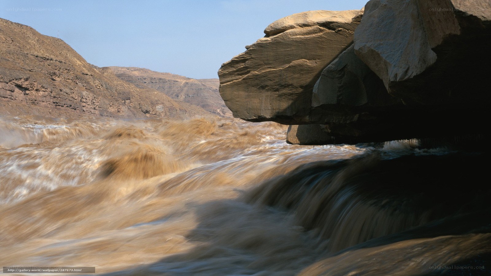 Raging river through canyon