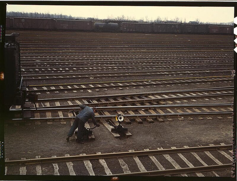 Rail yard worker at switch