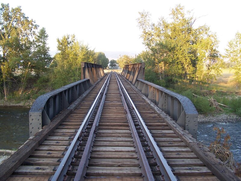 Railroad Bridge over River — Brown