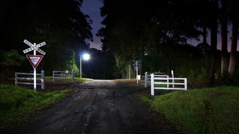 Railroad Crossing at Night — Black