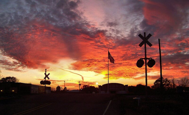Railroad Crossing at Sunset — Red