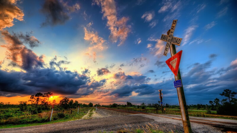 Railroad Crossing Sign — Blue, Dramatic, Sunset