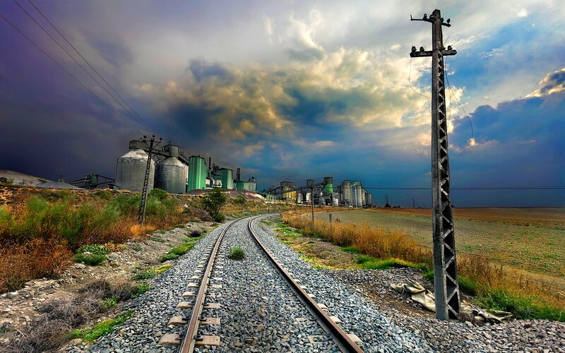 Railroad Tracks and Silos — Blue