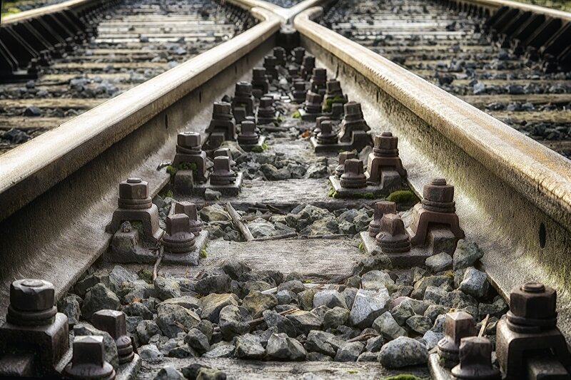 Railroad Tracks at Junction — Gray