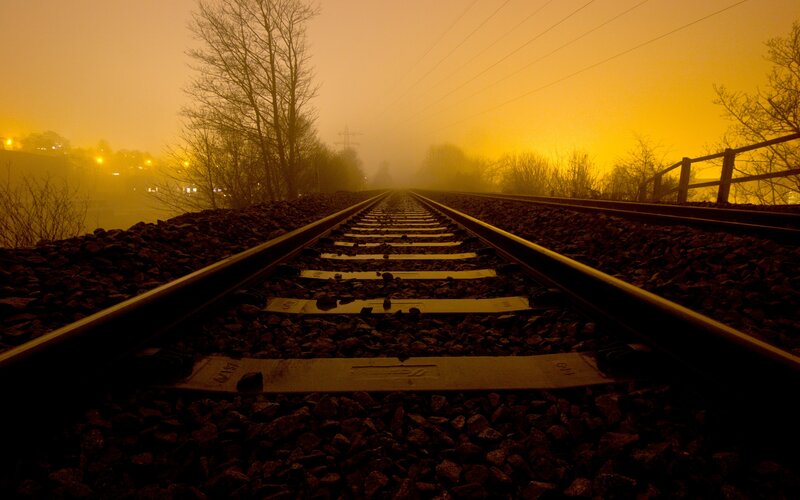 Railroad Tracks at Night — Yellow
