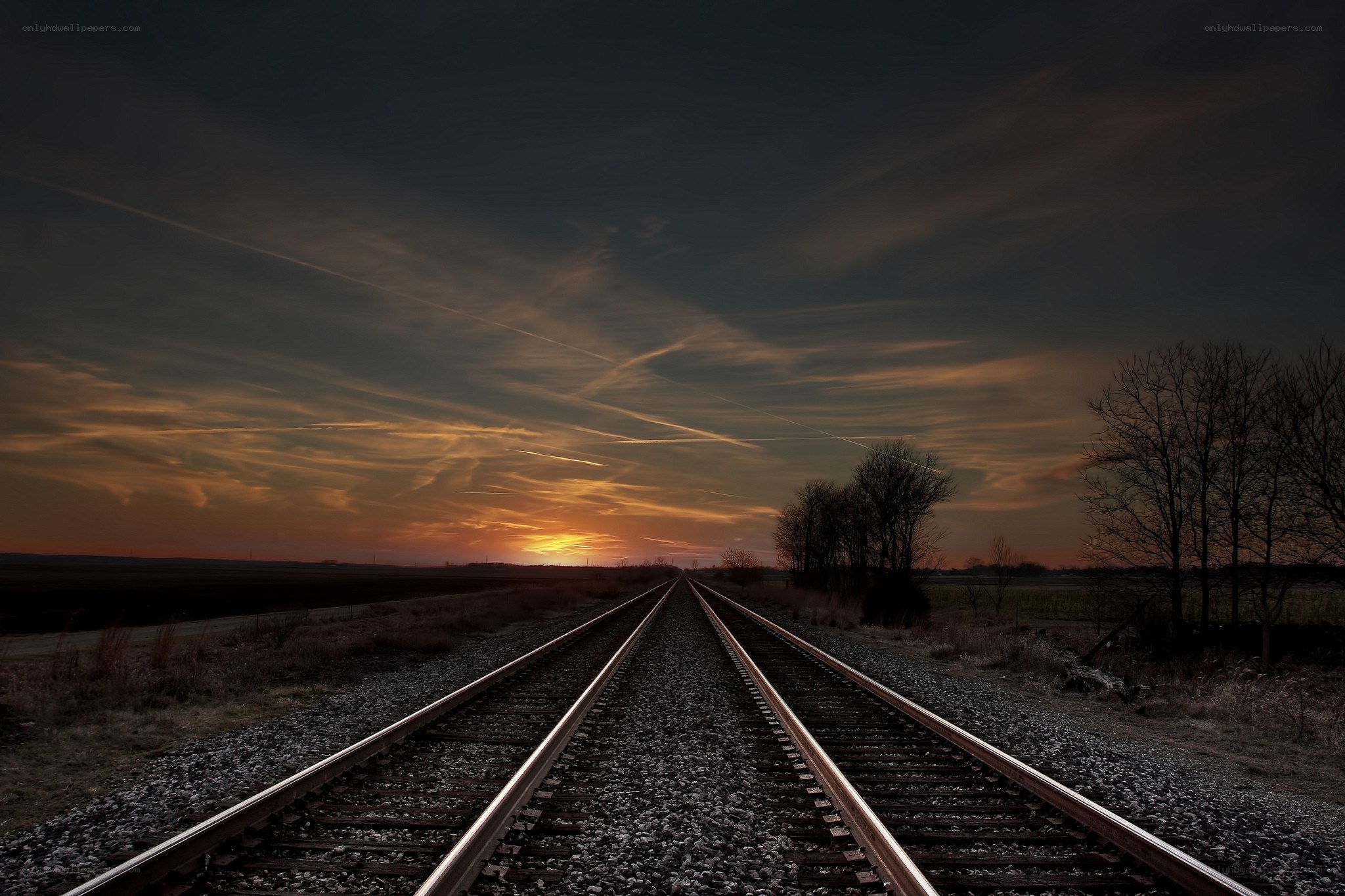 Railroad tracks at sunset