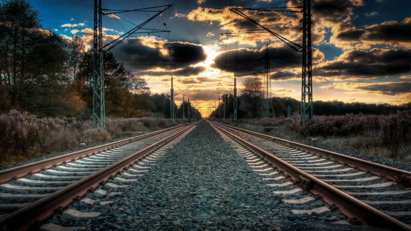 Railroad Tracks at Sunset — Blue, Dramatic, Photograph, Clouds
